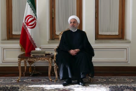 Iranian President Hassan Rouhani is seen during a meeting with Iran's Foreign Minister Mohammad Javad Zarif and with deputies and Senior directors of the Ministry of Foreign Affairs in Tehran