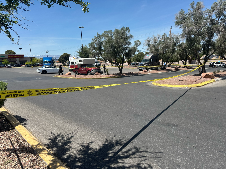 Police tape surrounds the scene of a double-shooting in southeast Las Vegas Tuesday. (KLAS/Joshua Peguero)