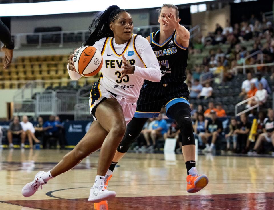 Indiana Fever guard Victoria Vivians (35) rushes up the court against Chicago Sky guard Allie Quigley (14) on Thursday, July 7, 2022, at Indiana Farmers Coliseum in Indianapolis. 