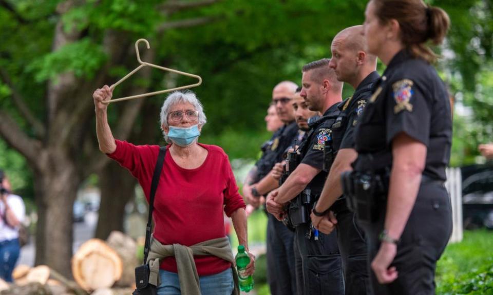 A pro-choice campaigner protests outside US Supreme Court Justice Brett Kavanaugh’s home.