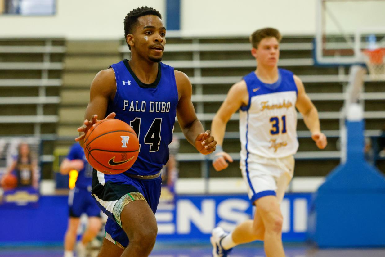 Palo Duro’s Audi Luckey (14) drives to the paint during the Gene Messer Classic Championship game against Frenship on Saturday, Dec. 4, 2021 at the Tiger Pit in Wolfforth, Texas.