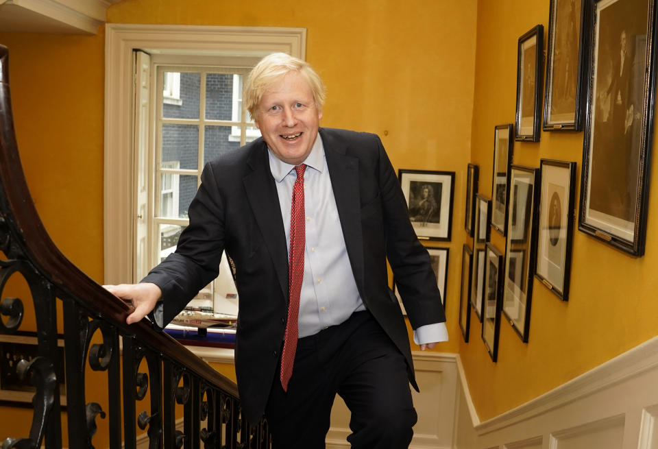 Handout photo issued by 10 Downing Street of Prime Minister Boris Johnson arriving back at Downing Street from hospital after the birth of his baby son with his partner Carrie Symonds.