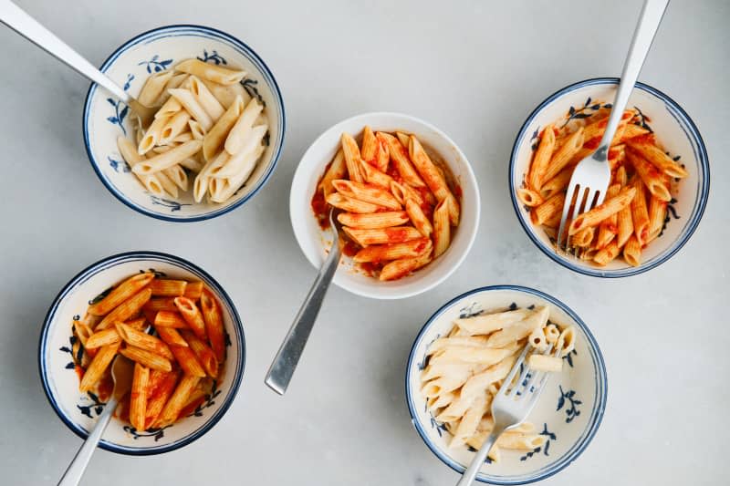 5 bowls of pasta, each with a different Pasta Queen sauce