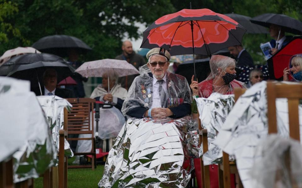 Veterans watch the official opening of the British Normandy Memorial via videolink at the National Memorial Arboretum in Alrewas, Staffs -  Jacob King/PA Wire