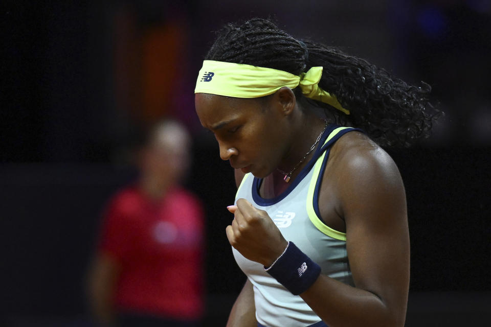 Coco Gauff of the United States reacts as she plays Ukraine's Marta Kostyuk during her quarterfinals tennis match at the WTA Tour in Stuttgart, Germany, Friday April 19, 2024. (Marijan Murat/dpa via AP)