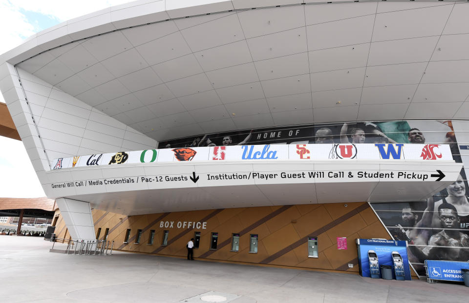 Logos of schools that were scheduled to participate in the canceled PAC-12 men's basketball tournament adorn the T-Mobile Arena in Las Vegas, Nevada, on March 2. (Photo: Ethan Miller via Getty Images)