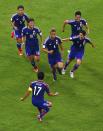 Japan's Keisuke Honda (4) celebrates with teammates after scoring a goal during the 2014 World Cup Group C soccer match between Ivory Coast and Japan at the Pernambuco arena in Recife June 14, 2014. REUTERS/Ruben Sprich