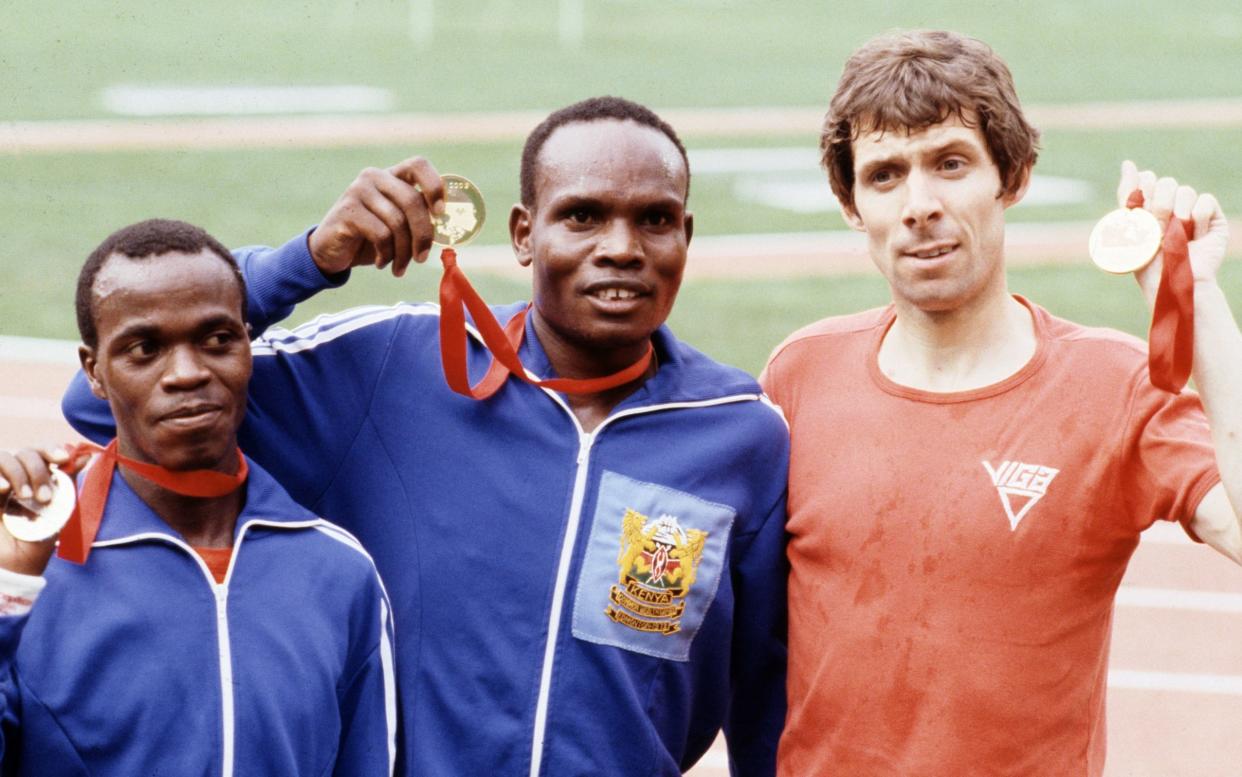 Henry Rono, centre, with his 5,000m gold medal at the Commonwealth Games in Edmonton, Canada, with the silver medallist, Mike Musyoki of Kenya, and the bronze medallist, Britain's Brendan Foster