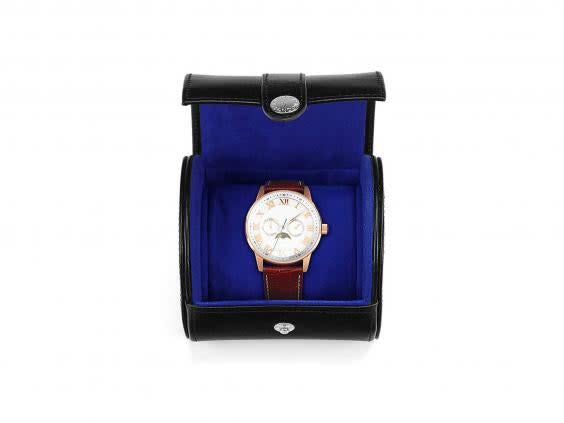 A watch roll will keep his watch safe and secure while he's at home and if he travels in the future (Aspinal of London)