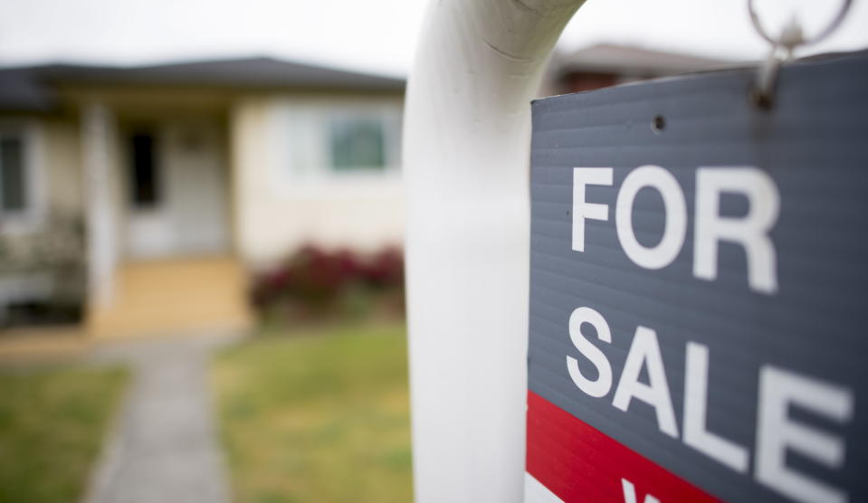 A real estate sign is pictured in Vancouver, B.C., Tuesday, June, 12, 2018. The Alberta Real Estate Association is providing its members with an emergency response app after a realtor was sexually assaulted at an open house in Calgary last month. THE CANADIAN PRESS Jonathan Hayward