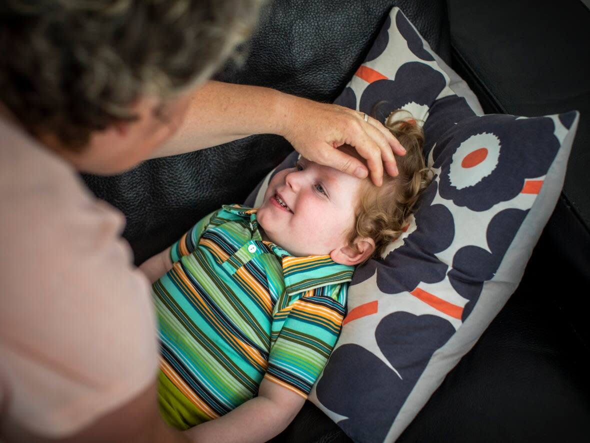 Mother Klara Cramer cares for her son Tomas at their home in Pitt Meadows, British Columbia on Thursday, June 18, 2020. (Ben Nelms/CBC - image credit)