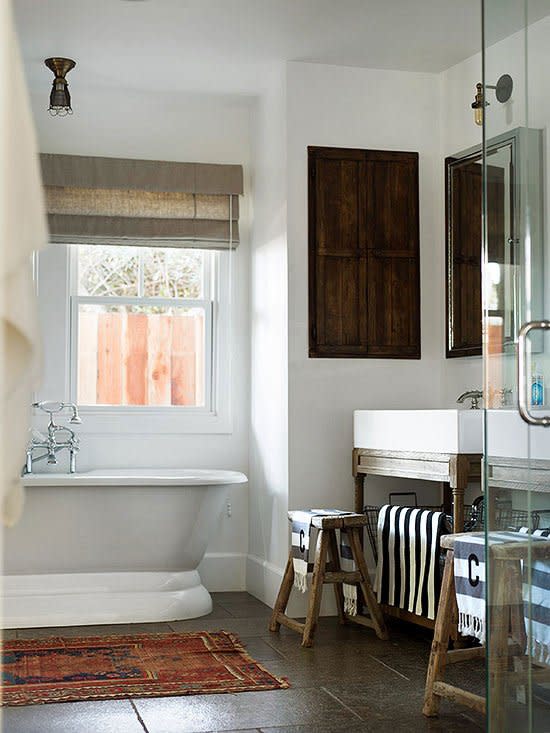 Rural references, rustic patinas, and classic details create fetching farmhouse bathrooms that stylishly tap into country comforts. These farmhouse bathroom designs smartly illustrate how you can combine new, vintage, and modern-revival items to fashion a timeless look.