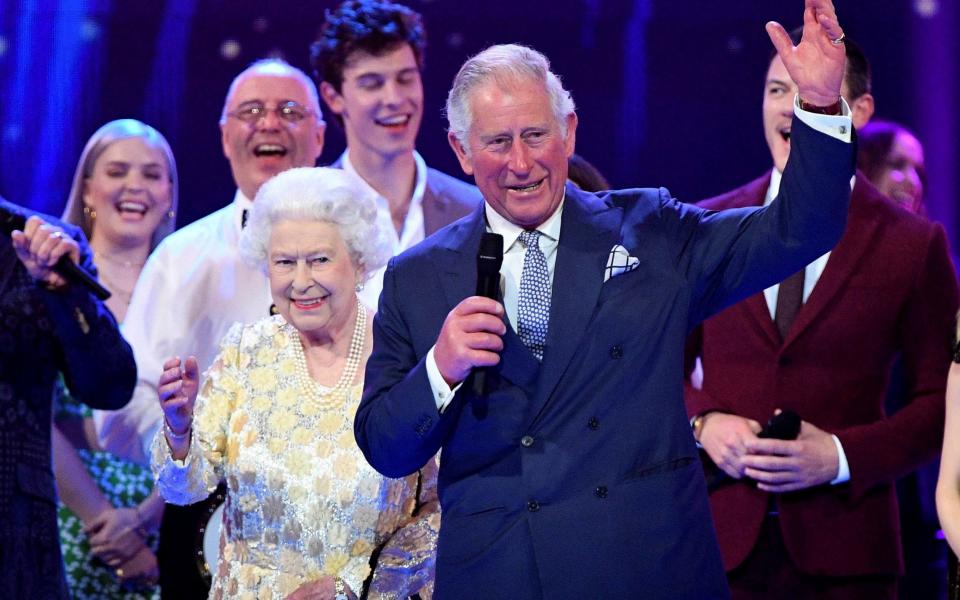 The Queen and Prince Charles on stage at the Royal Albert Hall - REUTERS