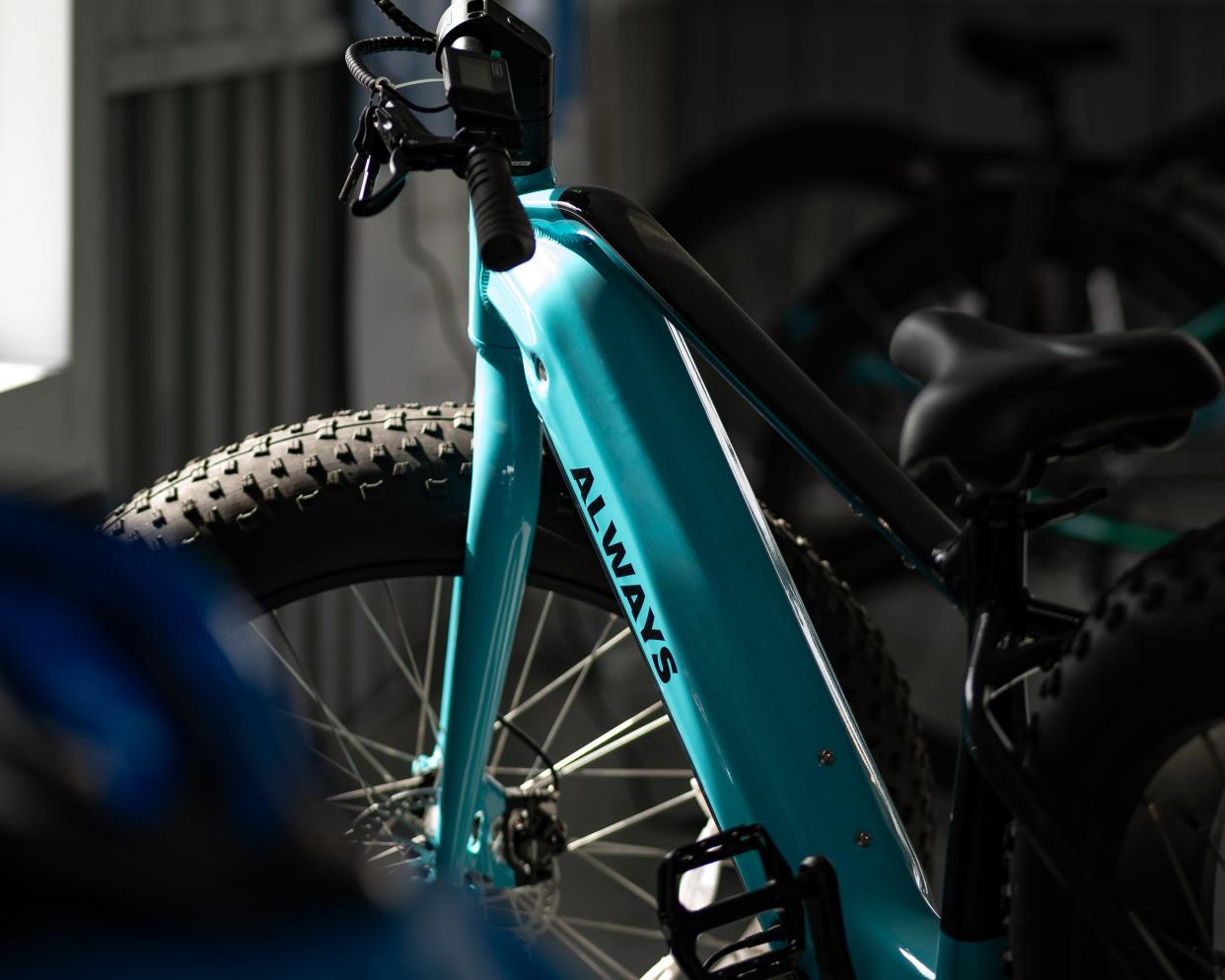 Electric bicycles sit on a rack for display at the new eBliss Experience Center in Clinton, NY on Saturday, April 27, 2024.