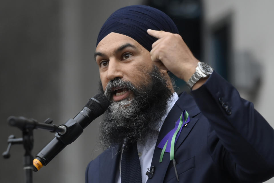 <p>NDP Leader Jagmeet Singh points to his turban as he speaks about racism during a speech at a vigil for the victims of the deadly vehicle attack on five members of the Canadian Muslim community in London, Ont., on Tuesday, June 8, 2021. Four of the members of the family died and one is in critical condition. Police have charged a London man with four counts of murder and one count of attempted murder. THE CANADIAN PRESS/Nathan Denette</p> 