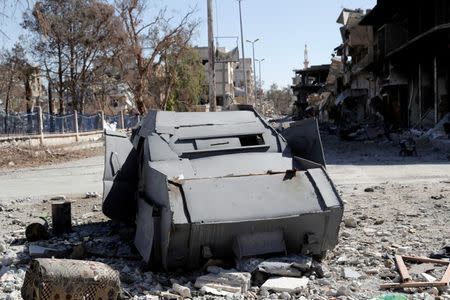 A vehicle of the Islamic State militants used for suicide car bombing is pictured along a road in Raqqa, Syria October 18, 2017. REUTERS/Erik De Castro