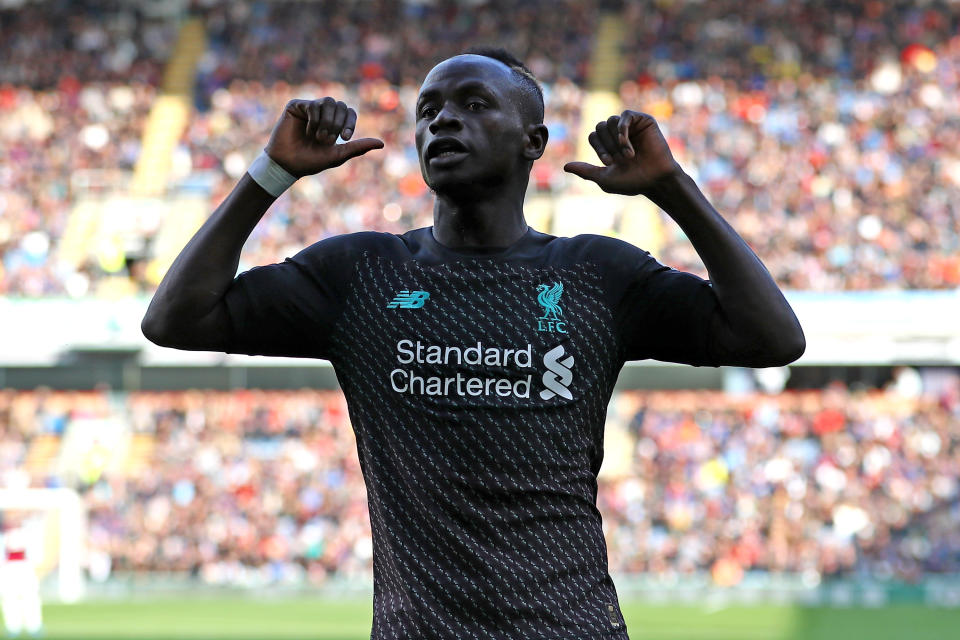 BURNLEY, ENGLAND - AUGUST 31: Sadio Mane of Liverpool celebrates after their team scores a goal during the Premier League match between Burnley FC and Liverpool FC at Turf Moor on August 31, 2019 in Burnley, United Kingdom. (Photo by Matthew Lewis/Getty Images)