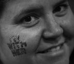 <p>A delegate shows off her temporary tattoo at the DNC in Philadelphia, PA. on July 28, 2016. (Photo: Khue Bui for Yahoo News) </p>