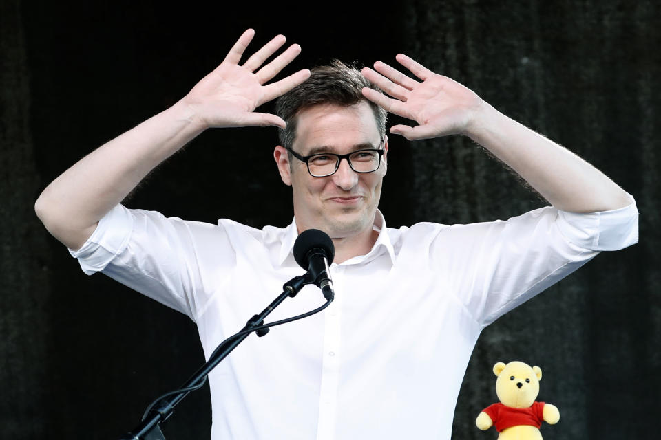 Mayor of Budapest Gergely Karacsony greets protesters in Budapest, Hungary, Saturday, June 5, 2021. Thousands of people gathered opposing the Hungarian government's plan of building a campus for China's Fudan University in Budapest. (AP Photo/Laszlo Balogh)