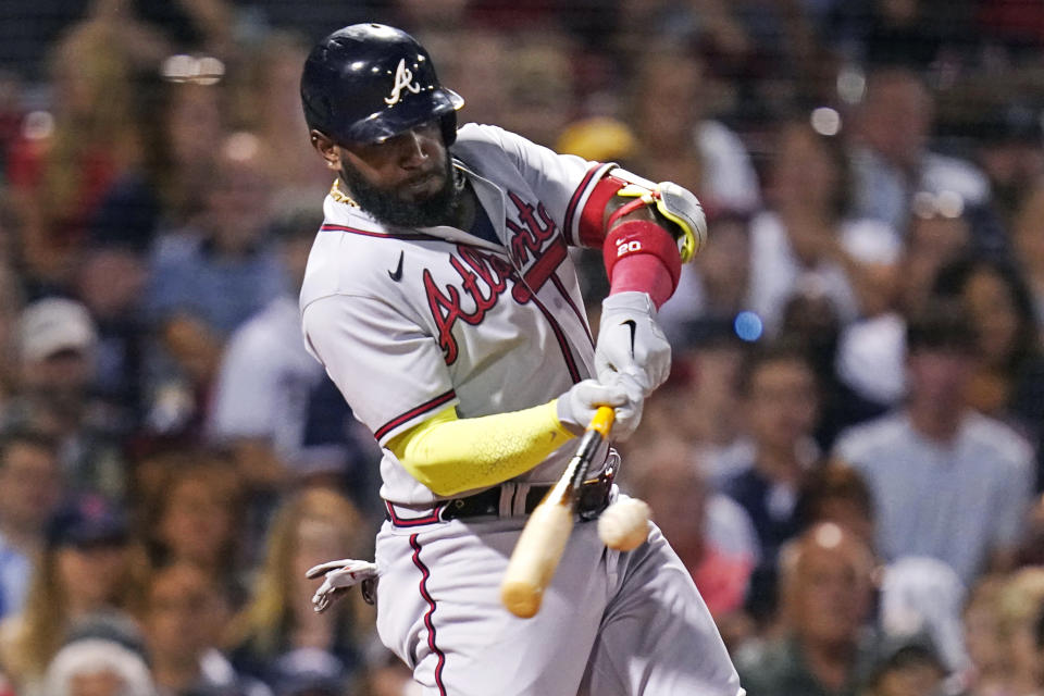 Atlanta Braves' Marcell Ozuna connects for a three-run home run off Boston Red Sox starting pitcher Nick Pivetta during the fourth inning of a baseball game Wednesday, Aug. 10, 2022, in Boston. (AP Photo/Charles Krupa)