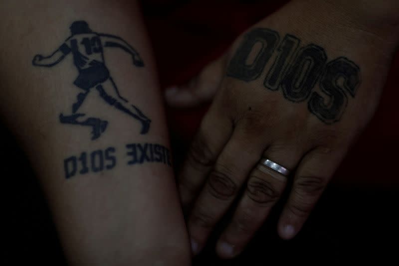 The Wider Image: Argentines celebrate 'eternal love' for Maradona with tattoos