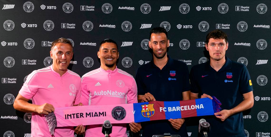 From left to right: Inter Miami Head Coach Phil Neville, Inter Miami midfielder Gregore Silva (26), FC Barcelona midfielder Sergio Busquets (5), and FC Barcelona defender Andreas Christensen attend a press conference before the start of an open training session in advance of their friendly soccer match at DRV PNK Stadium on Monday, July 18, 2022.