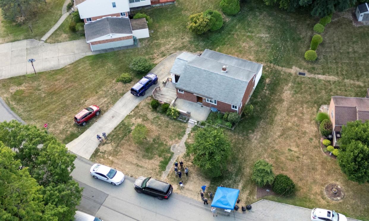 <span>Law enforcement officers during their investigation at the home of the suspected gunman 20-year-old Thomas Matthew Crooks. He is accused of the attempted assassination of former president Donald Trump.</span><span>Photograph: Carlos Osorio/Reuters</span>