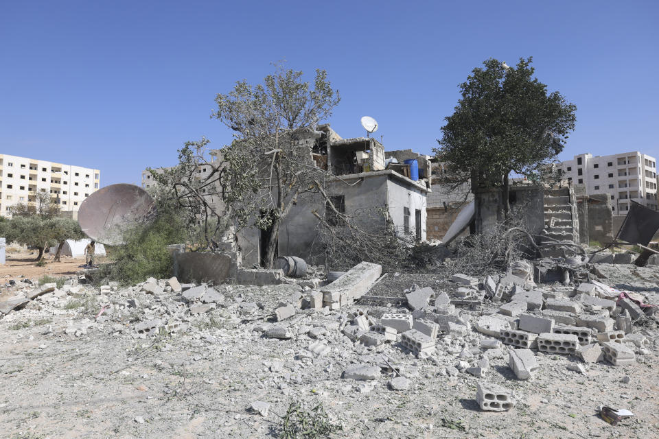 A building destroyed in the shelling from the Syrian government positions is seen in Idlib, Syria, Friday, Oct. 6, 2023. (AP Photo/Ghaith Alsayed)