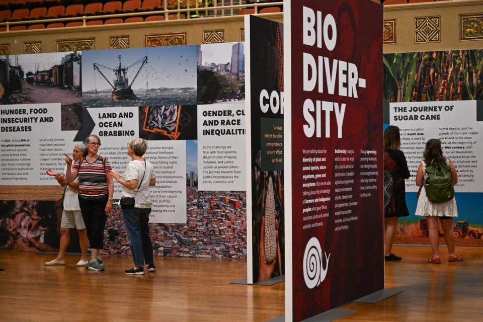 Visitors explore educational displays at the first Terra Madre Americas event sponsored by Slow Food at the Sacramento Memorial Auditorium on Friday.