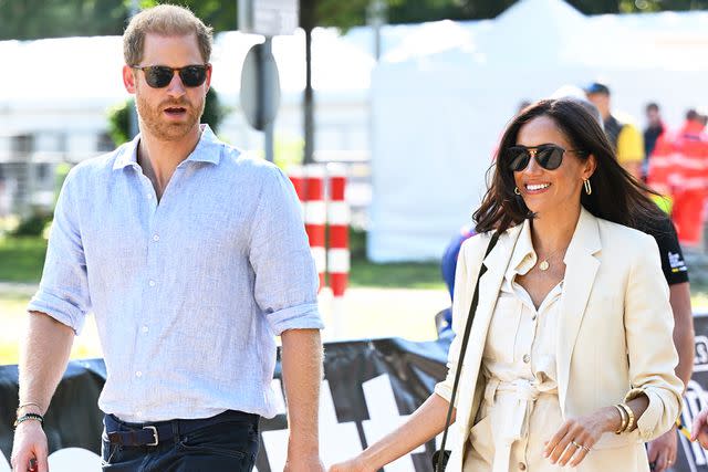<p>Karwai Tang/WireImage</p> Prince Harry and Meghan Markle at the 2023 Invictus Games in Germany.