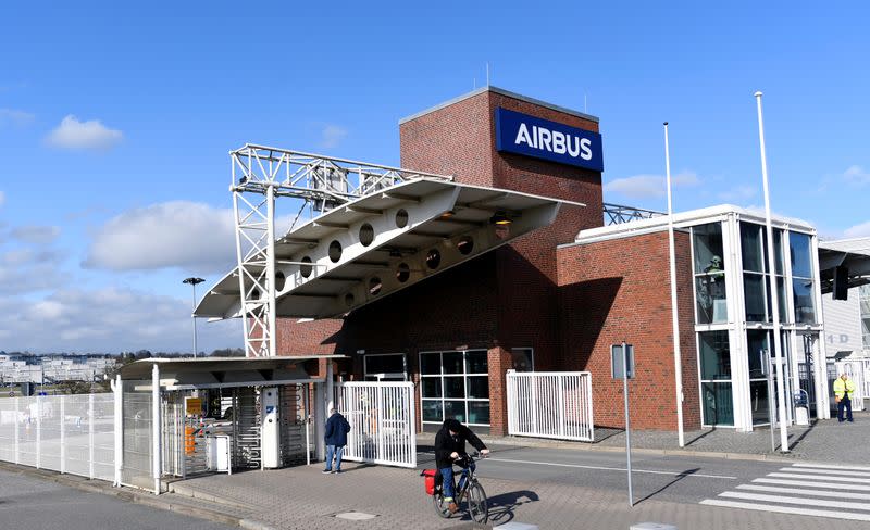 An employee leaves the plant of Airbus during the outbreak of coronavirus disease (COVID19) in Hamburg