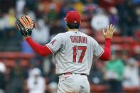 Los Angeles Angels' Shohei Ohtani signals to his dugout during the second inning of a baseball game against the Boston Red Sox, Monday, April 17, 2023, in Boston. (AP Photo/Michael Dwyer)