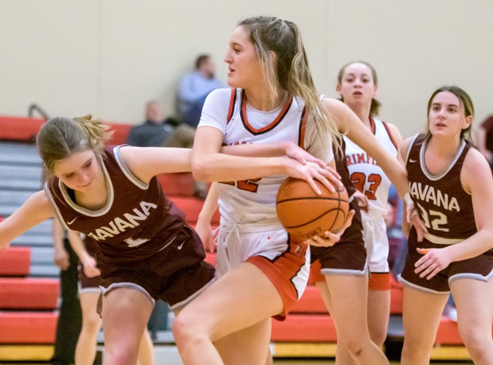 Havana's Josie Hughes, left, tangles with Brimfield's Ava Heinz in the first half Monday, Jan. 23, 2023 at Brimfield High School. The Ducks defeated the Indians 39-31.