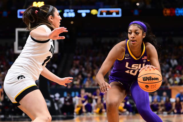 Ben Solomon/NCAA Photos via Getty Angel Reese playing basketball.