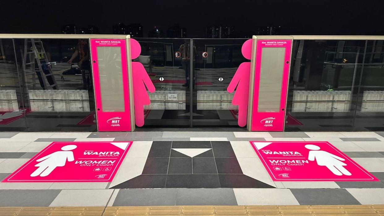 An MRT stop in Kuala Lumpur showcasing the women-only coaches on the trains.