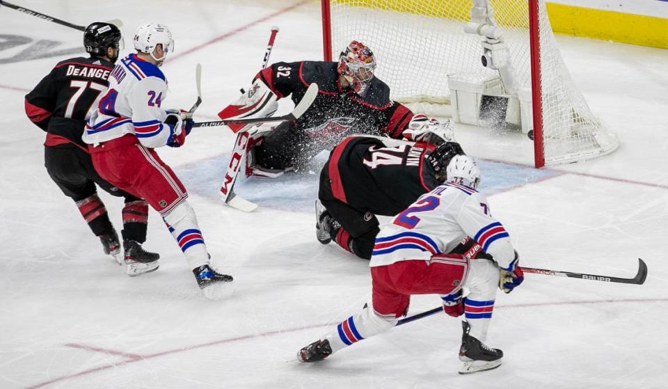 New York Rangers Filip Chytil (72) scores on Carolina Hurricanes goalie Antii Raanta (32 ) in the first period on Wednesday, May 18, 2022 during game one of the Stanley Cup second round at PNC Arena in Raleigh, N.C.