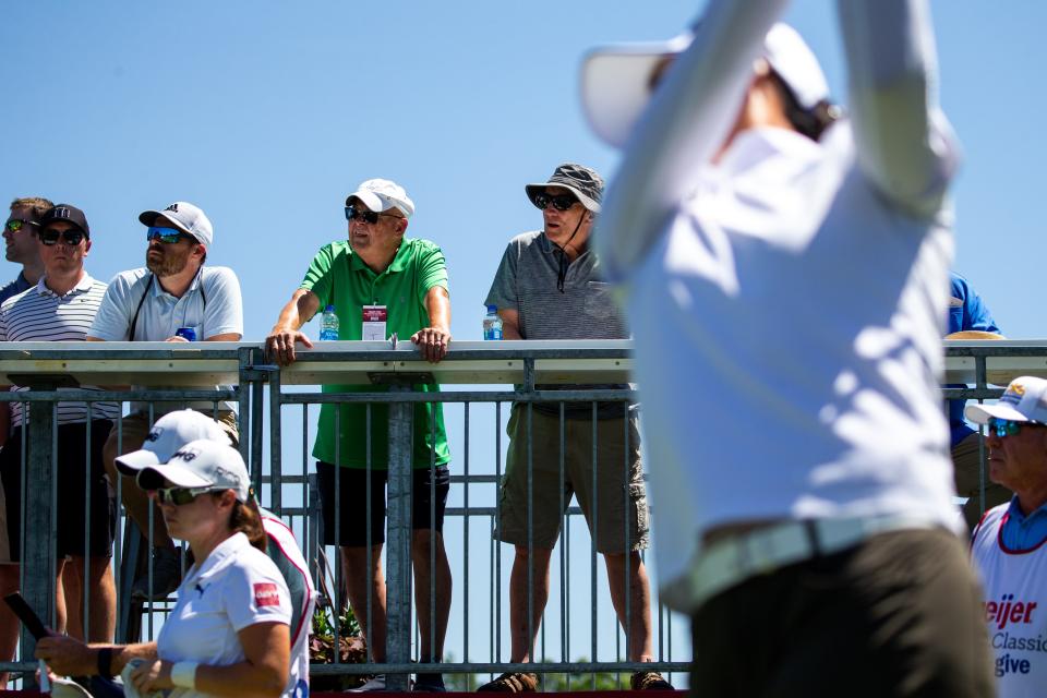 Spectators watch as Amy Yang tees off during the Meijer LPGA Classic Thursday, June 16, 2022, at Blythefield Country Club in Belmont Michigan. 