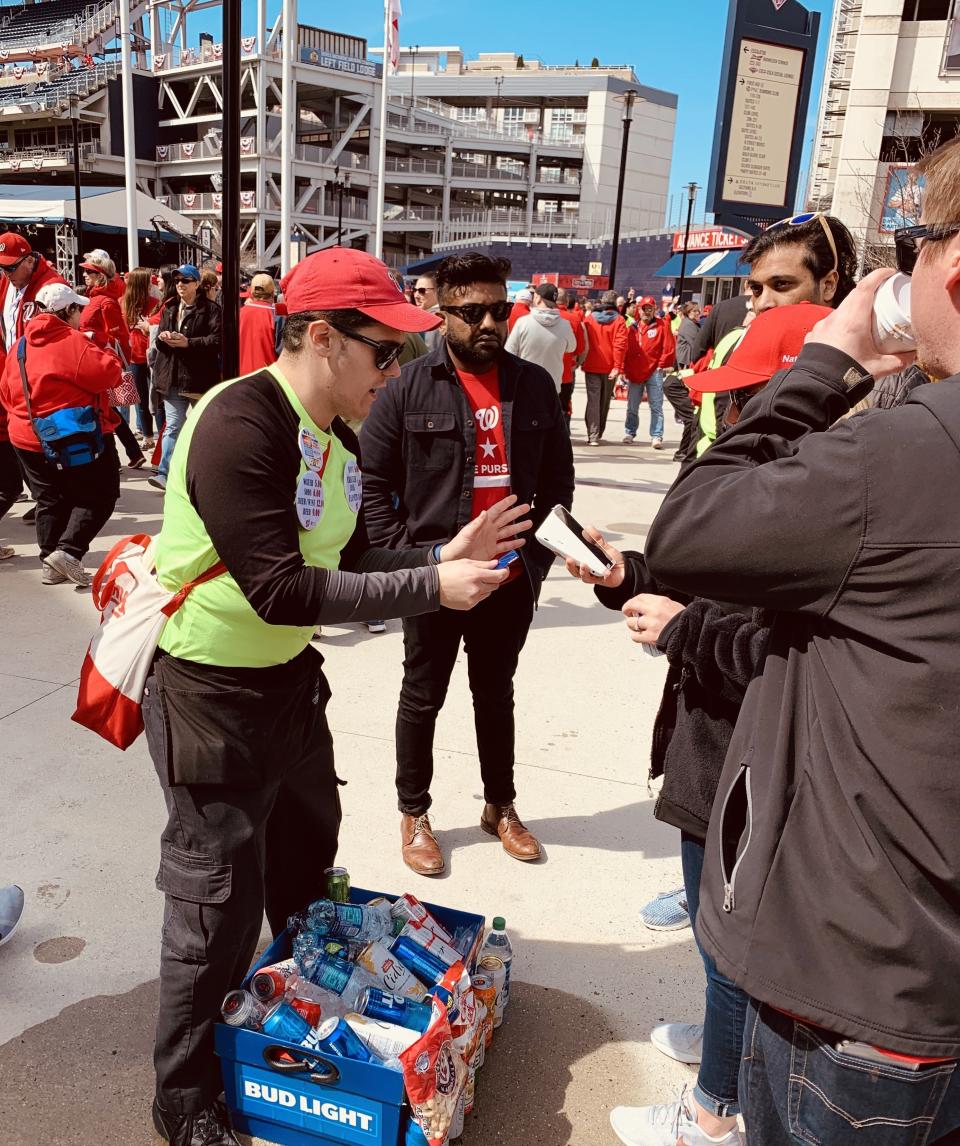 A beer seller uses Square Terminal to take payment at Nationals Park in Washington, DC. (Square) 