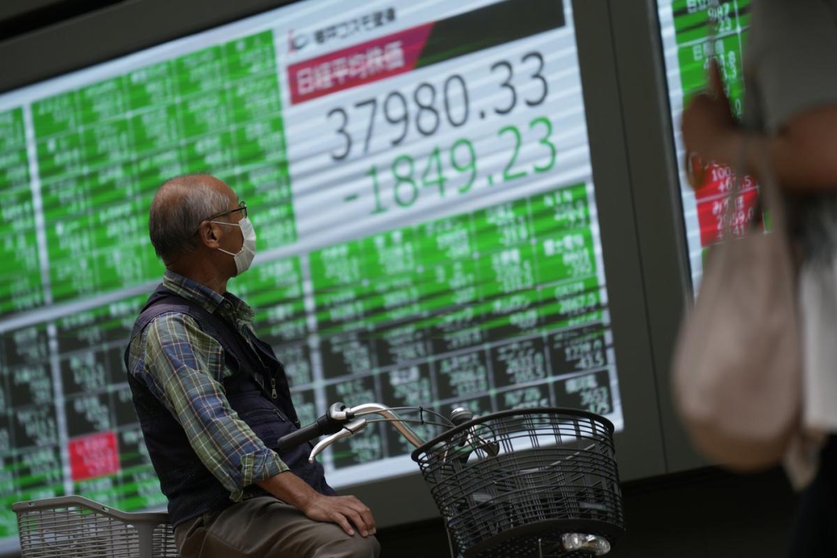 Global markets get bumpy ride, as Japan’s stocks slump while Chinese markets soar