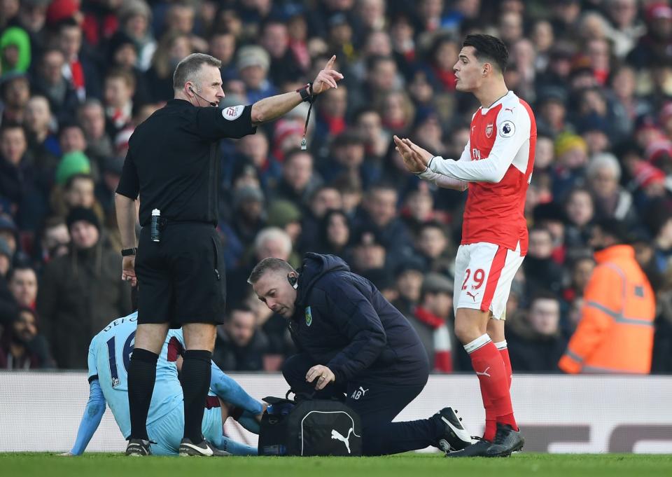 John Moss sends off Granit Xhaka of Arsenal