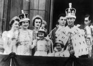<p>The British Royal Family appeared on the Buckingham Palace balcony following the coronation. George's daughters, Elizabeth and Margaret, are in the center.</p>