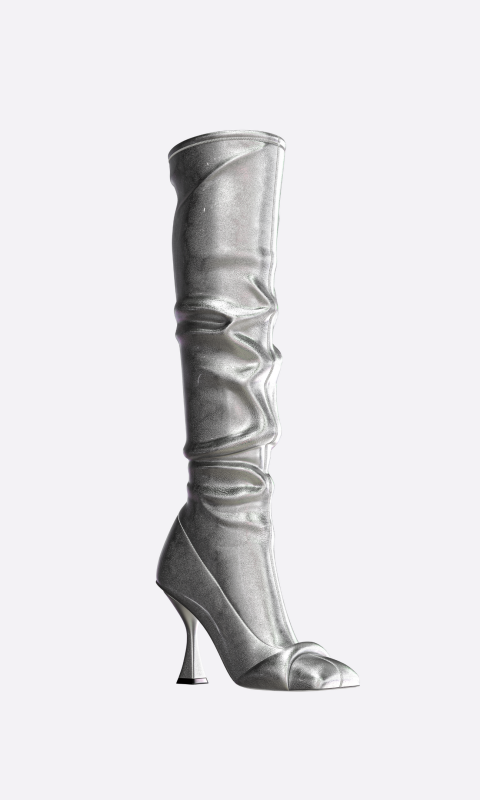 <p>Hanifa Zoe Boot, $699, <a href="https://hanifa.co/products/zoe-boot?_pos=1&_sid=774f53a7a&_ss=r&variant=39867619278911" rel="nofollow noopener" target="_blank" data-ylk="slk:available here;elm:context_link;itc:0;sec:content-canvas" class="link ">available here</a></p>