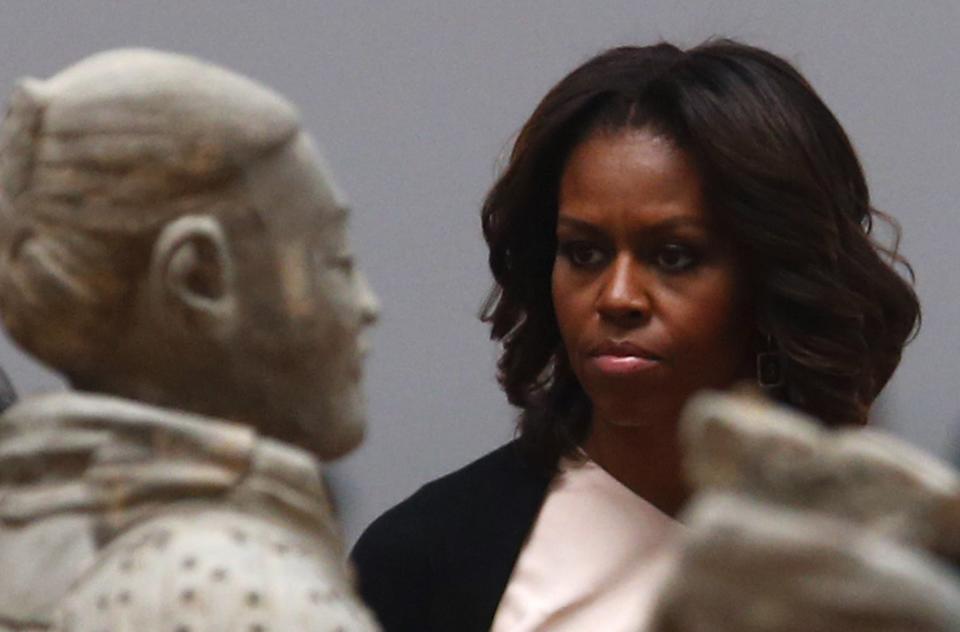 U.S. first lady Michelle Obama visits the Museum of Qin Terracotta Warriors and Horses, in Xi'an, Shaanxi province, March 24, 2014. (REUTERS/Petar Kujundzic)