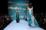 Models walk the runway at the Monique Lhuillier spring 2013 show, Saturday, Sept. 8, 2012, during Fashion Week in New York. (AP Photo/Diane Bondareff)