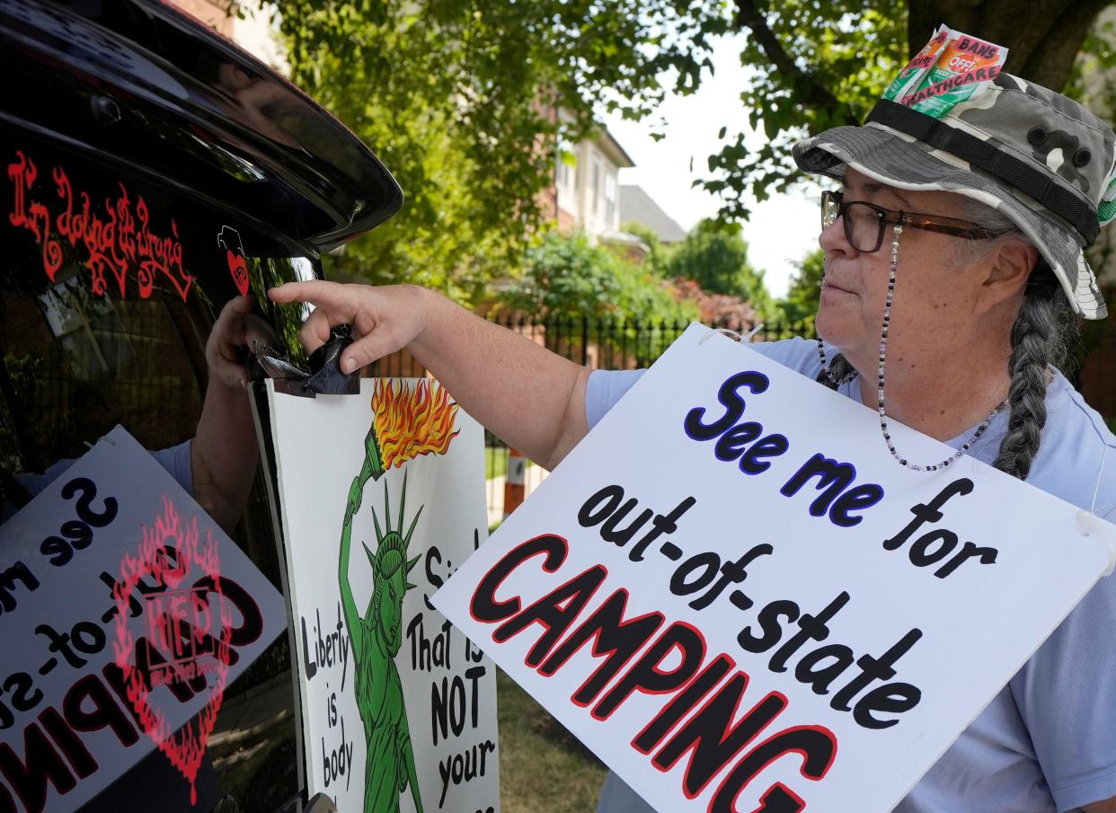 July 4, 2022; Columbus, Ohio, United States; Teresa Dendy decorates her vehicle offering women rides for out-of-state camping, a euphamism for someone seeking abortion access, before driving in the Doo Dah Parade in the Short North on the Fourth of July. The parade is steeped in satire and is a Columbus Independence Day tradition.Mandatory Credit: Barbara J. Perenic/Columbus Dispatch