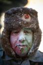 IBI, SPAIN - DECEMBER 28: A Reveller poses after taking part in the battle of 'Enfarinats', a flour fight in celebration of the Els Enfarinats festival on December 28, 2012 in Ibi, Spain. Citizens of Ibi annually celebrate the festival with a battle using flour, eggs and firecrackers. The battle takes place between two groups, a group of married men called 'Els Enfarinats' which take the control of the village for one day pronouncing a whole of ridiculous laws and fining the citizens that infringe them and a group called 'La Oposicio' which try to restore order. At the end of the day the money collected from the fines is donated to charitable causes in the village. The festival has been celebrated since 1981 after the town of Ibi recovered the tradition but the origins remain unknown. (Photo by David Ramos/Getty Images)