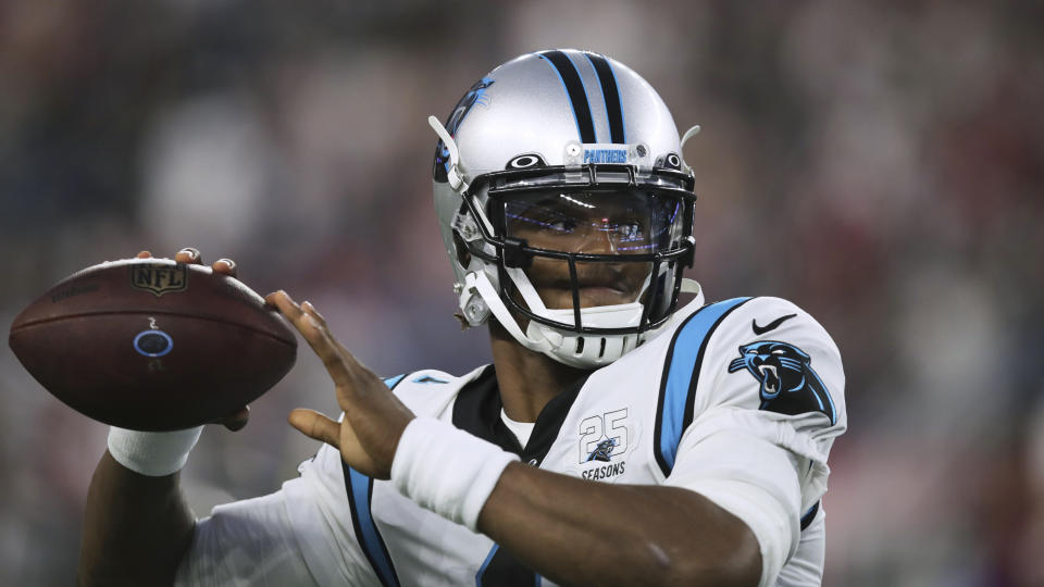 Could quarterback Cam Newton land in Chicago? (AP Photo/Charles Krupa)