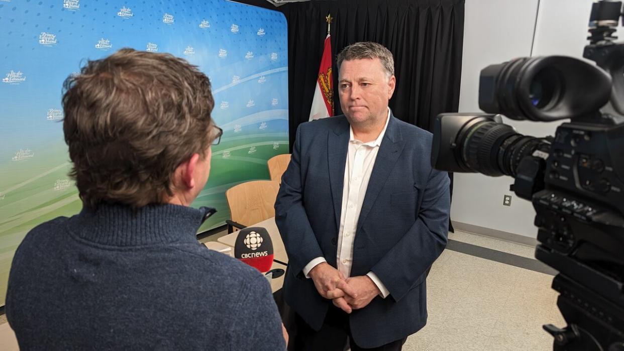 P.E.I. Premier Dennis King answers media questions after the release of the province's first population strategy update in six years.  (Ken Linton/CBC - image credit)