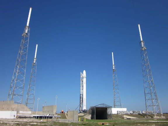 SpaceX's first Falcon 9 rocket to launch an unmanned Dragon capsule to the International Space Station stands atop its launch pad at Cape Canaveral Air Force Station, Fla., one day before its May 19, 2012 launch.