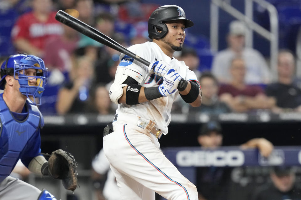 Miami Marlins second baseman Luis Arraez (3) singles to center field during the third inning of a baseball game against the Chicago Cubs, Sunday, April 30, 2023, in Miami. (AP Photo/Marta Lavandier)